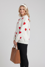 Junia | Damestrui met hartjesprint – ronde hals, lange mouwen, pullover met relaxte pasvorm