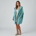 Vaerelle | Oversized damesvest met capuchon – knielengte