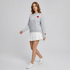 Fiorina | Damestrui met hartjesborduursel – Loszittende pullover met ronde hals