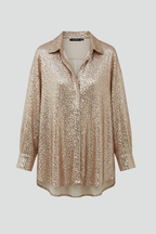 Phaelin | Glanzende damesblouse met oversized pasvorm en lange mouwen